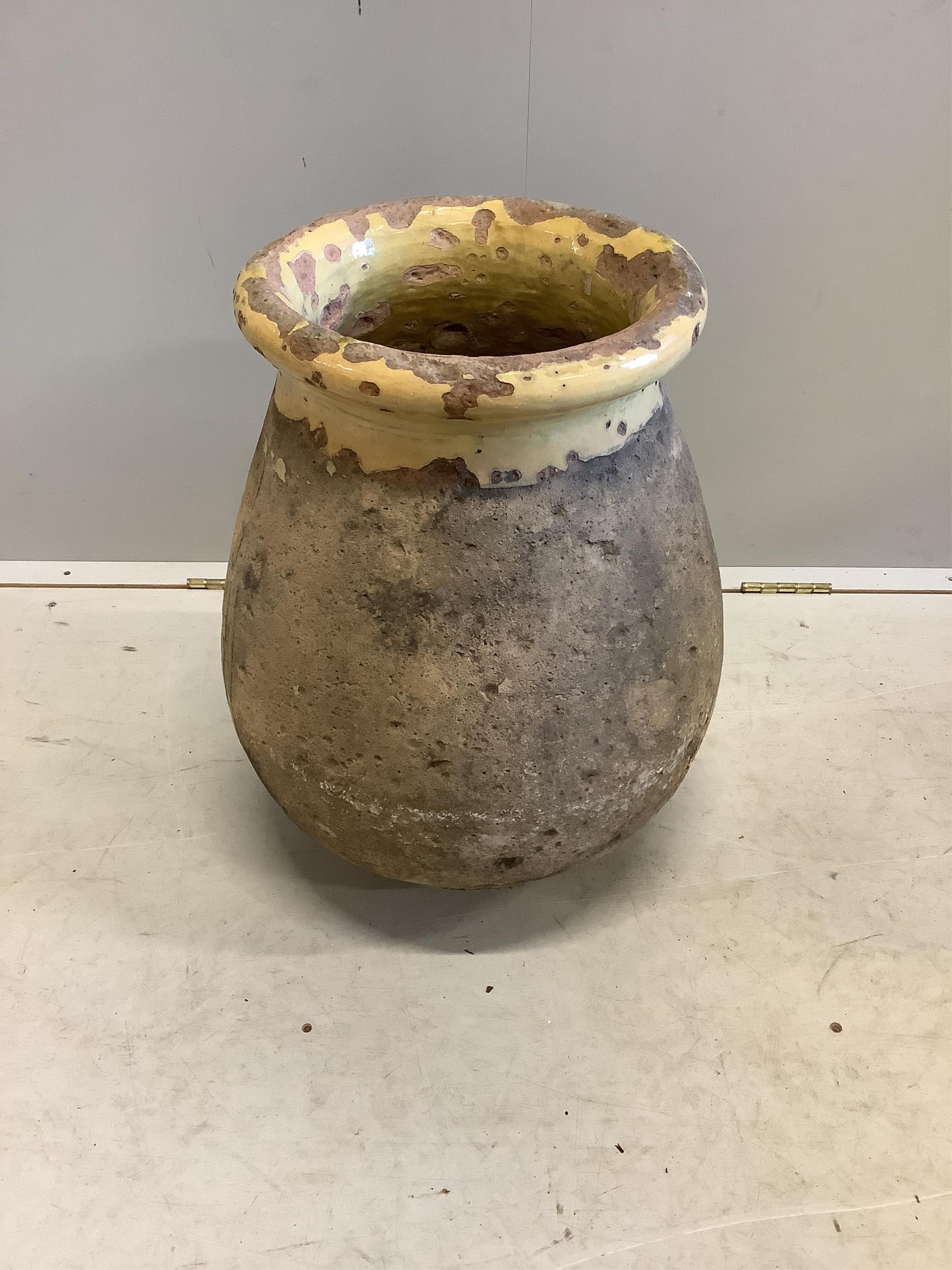 A glazed earthenware Biot pot, height 56cm. Condition - poor